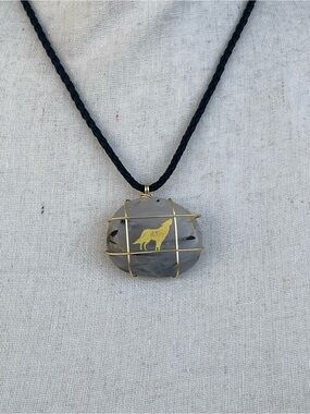 Tourmalinated Quartz Necklace with Wolf Gold Tone Accent on Black Braided Cord